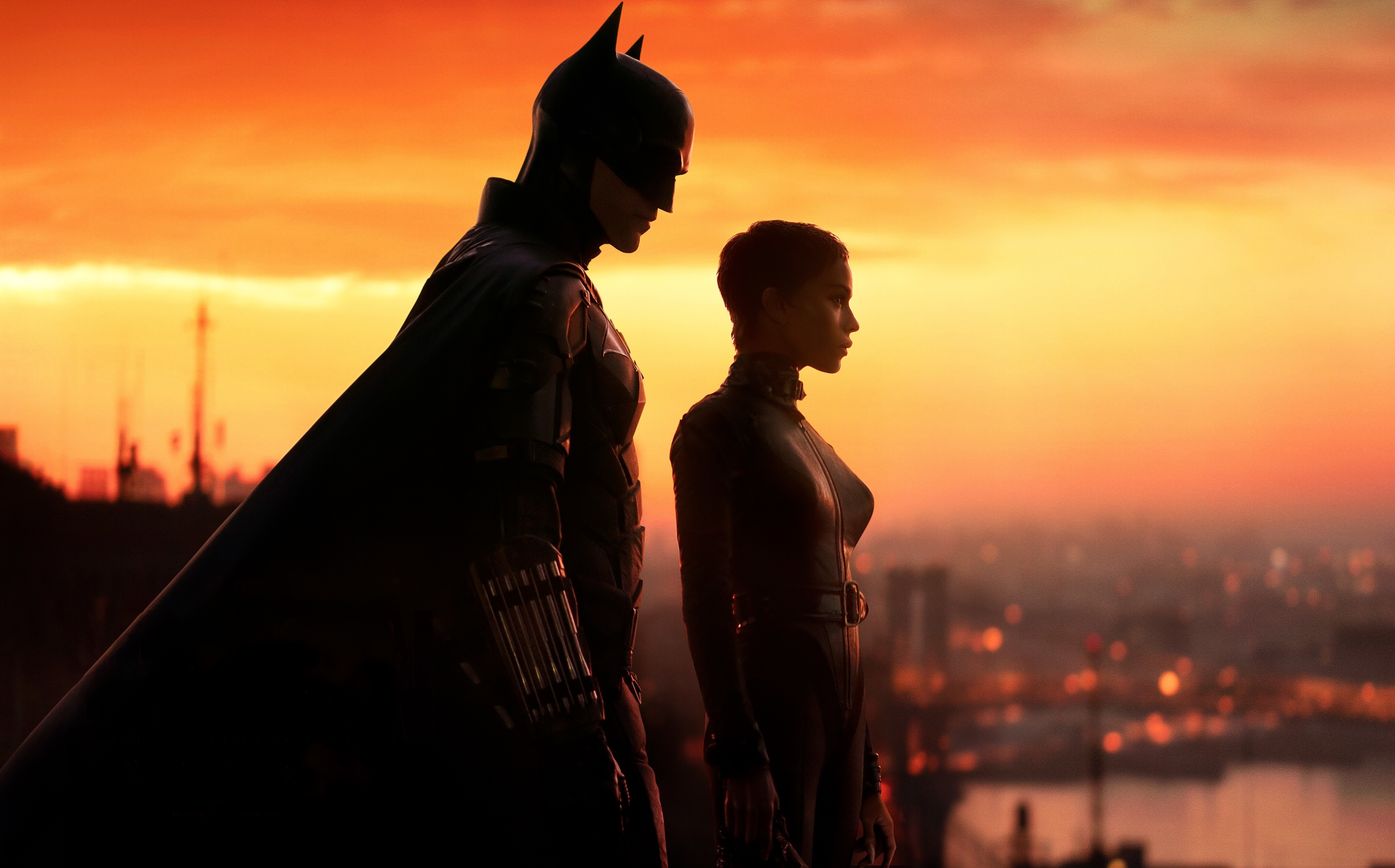 A Silhouette Of Hope Against The Golden Skyline